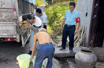 甘霖解民忧  用情润人心