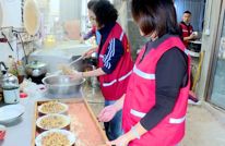 渠县爱心志愿者协会开展“重阳敬老 食暖人心”老年助餐活动