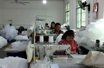 【连续报道】山村工坊“缝”出跨国浪漫 （一）深山藏“嫁衣” 山村婚纱闯海外